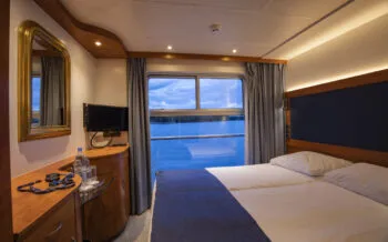 Upper deck cabin aboard boutique river cruise ship MS Thurgau Saxonia (Thurgau Travel), Berlin Tegel, Berlin, Germany