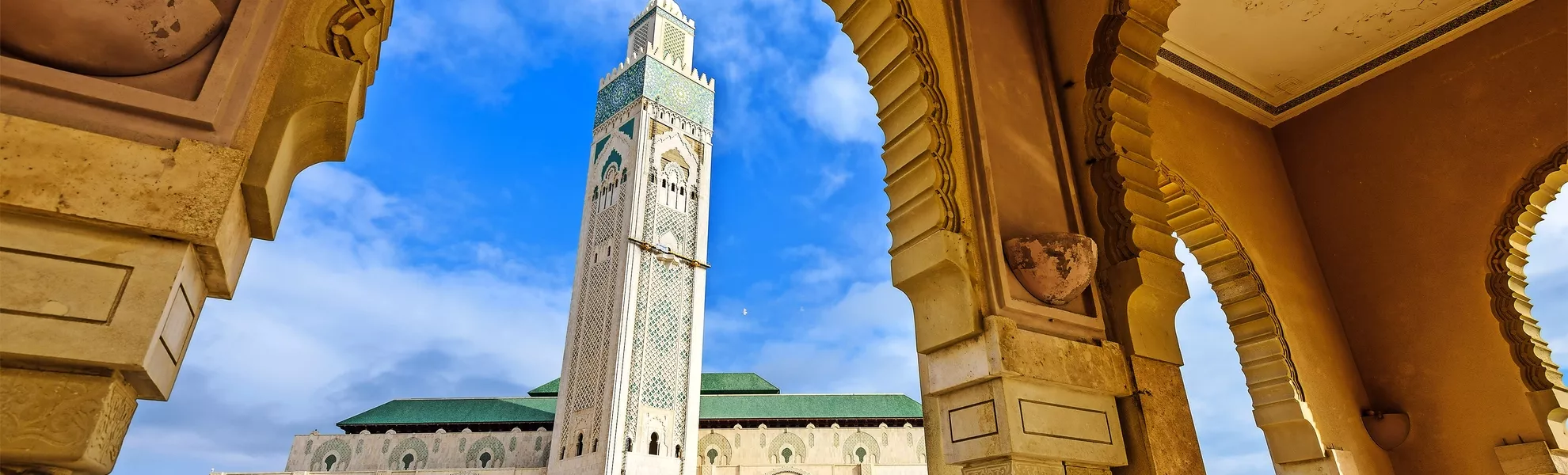 Minarett der Moschee Hassan II in Casablanca - © SeanPavonePhoto - stock.adobe.com